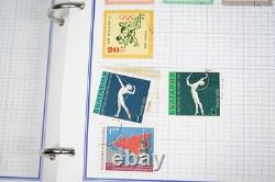 Collection mondiale de plus de 3 000 timbres neufs et utilisés stockés dans un album Mystic