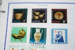 Collection mondiale de plus de 3 000 timbres neufs et utilisés stockés dans un album Mystic