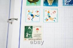 Collection mondiale de plus de 3 000 timbres neufs et utilisés stockés dans un album Mystic