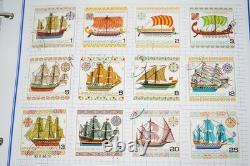 Collection mondiale de plus de 3 000 timbres neufs et utilisés stockés dans un album Mystic