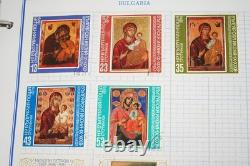 Collection mondiale de plus de 3 000 timbres neufs et utilisés stockés dans un album Mystic