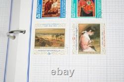 Collection mondiale de plus de 3 000 timbres neufs et utilisés stockés dans un album Mystic