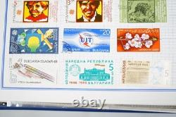 Collection mondiale de plus de 3 000 timbres neufs et utilisés stockés dans un album Mystic