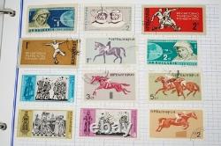 Collection mondiale de plus de 3 000 timbres neufs et utilisés stockés dans un album Mystic