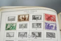 Collection mondiale de plus de 8 000 timbres des années 1870 à 1970, neufs et oblitérés, dans un album Minkus