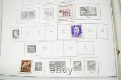 Collection mondiale de plus de 8 000 timbres des années 1870 à 1970, neufs et oblitérés, dans un album Minkus