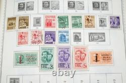 Collection mondiale de plus de 8 000 timbres des années 1870 à 1970, neufs et oblitérés, dans un album Minkus