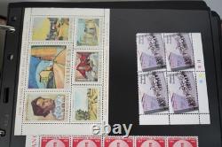 Collection mondiale de plus de 825 blocs/feuilles/carrés neufs et utilisés stockés dans un album