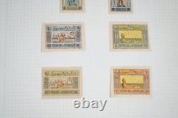 Collection mondiale de près de 2 000 timbres neufs et oblitérés dans un album