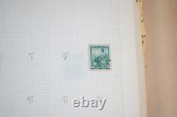 Collection mondiale de près de 2 000 timbres neufs et oblitérés dans un album