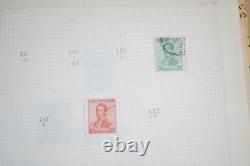 Collection mondiale de près de 2 000 timbres neufs et oblitérés dans un album