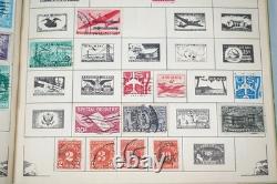 Collection mondiale de près de 2 000 timbres, principalement oblitérés, conservés dans un album