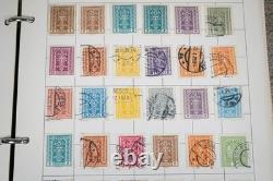 Collection mondiale de près de 2 300 timbres neufs et usagés conservés dans un album