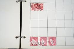 Collection mondiale de près de 2 300 timbres neufs et usagés conservés dans un album