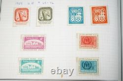 Collection mondiale de timbres A-i de 700+ timbres neufs et utilisés stockés dans un album Harris