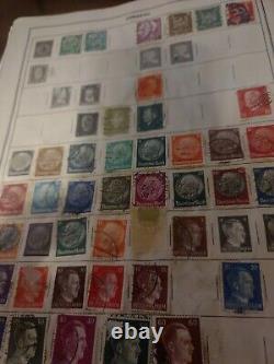 Collection mondiale de timbres dans l'album de voyage HE Harris de 1952. Fascinant