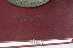 Collection mondiale de timbres dans un album H. E. Harris