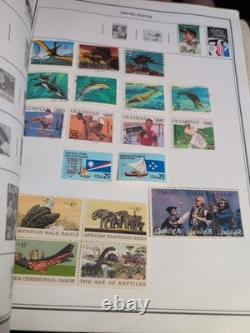 Collection mondiale de timbres dans un album vintage Minkus de 1958. MAGNIFIQUE des années 1800 Fwd
