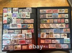 Collection mondiale de timbres de plus de 1 000 timbres dans deux albums, provenant de plus de 50 pays Collection mondiale de timbres de plus de 1 000 timbres dans deux albums, provenant de plus de 50 pays