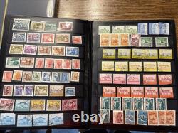 Collection mondiale de timbres de plus de 1 000 timbres dans deux albums, provenant de plus de 50 pays