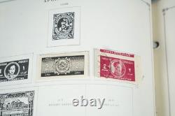 Collection mondiale des années 1850 à 1930 de plus de 5 350 timbres neufs et oblitérés dans un album Scott