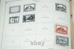 Collection mondiale des années 1850 à 1930 de plus de 5 350 timbres neufs et oblitérés dans un album Scott