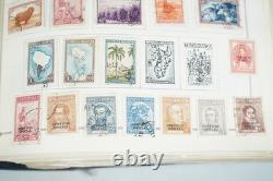 Collection mondiale des années 1850 à 1930 de plus de 5 350 timbres neufs et oblitérés dans un album Scott