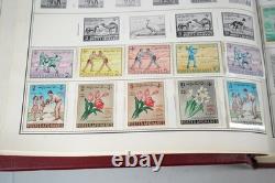 Collection mondiale des années 1880 aux années 1960 de plus de 3 200 timbres neufs et oblitérés dans un album Harris