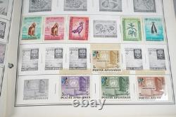 Collection mondiale des années 1880 aux années 1960 de plus de 3 200 timbres neufs et oblitérés dans un album Harris