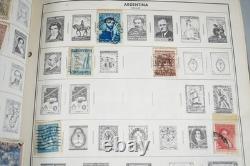 Collection mondiale des années 1880 aux années 1960 de plus de 3 200 timbres neufs et oblitérés dans un album Harris