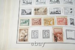 Collection mondiale des années 1880 aux années 1960 de plus de 3 200 timbres neufs et oblitérés dans un album Harris