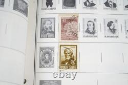 Collection mondiale des années 1880 aux années 1960 de plus de 3 200 timbres neufs et oblitérés dans un album Harris