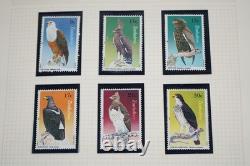 Collection thématique mondiale d'oiseaux de plus de 250 timbres MNH dans un album 1 FDC