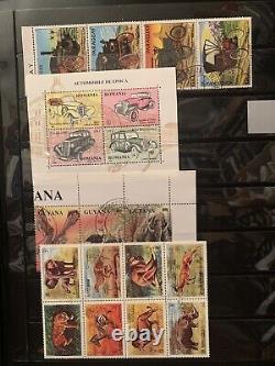 Collections de timbres du monde entier dans un album neufs et usagés animaux voitures insectes