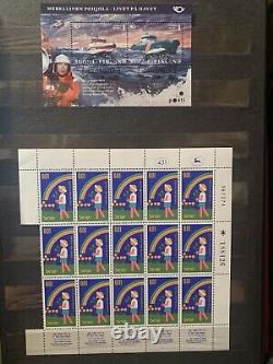 Collections de timbres du monde entier en lots dans des albums de paires et de blocs
