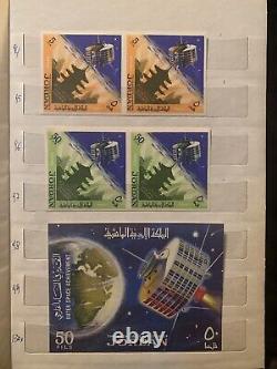 Collections de timbres du monde entier en lots dans des albums paires & blocs neufs et usagés