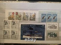 Collections de timbres du monde entier en lots dans des albums, paires et blocs.
