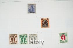D-H 1880s-1960s COLLECTION DE 2400 TIMBRES NEUFS ET USAGÉS DANS UN ALBUM HARRIS