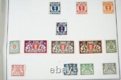 D-H 1880s-1960s COLLECTION DE 2400 TIMBRES NEUFS ET USAGÉS DANS UN ALBUM HARRIS