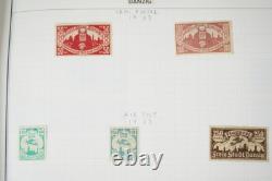 D-H 1880s-1960s COLLECTION DE 2400 TIMBRES NEUFS ET USAGÉS DANS UN ALBUM HARRIS