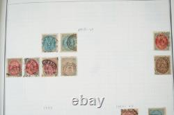 D-H 1880s-1960s COLLECTION DE 2400 TIMBRES NEUFS ET USAGÉS DANS UN ALBUM HARRIS