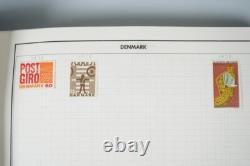 D-H 1880s-1960s COLLECTION DE 2400 TIMBRES NEUFS ET USAGÉS DANS UN ALBUM HARRIS