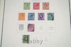 GRANDE-BRETAGNE 1880s-1980s COLLECTION DE 1 050+ TIMBRES NEUFS ET USAGÉS DANS UN ALBUM SCOTT
