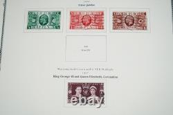 GRANDE-BRETAGNE 1880s-1980s COLLECTION DE 1 050+ TIMBRES NEUFS ET USAGÉS DANS UN ALBUM SCOTT