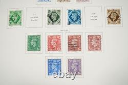 GRANDE-BRETAGNE 1880s-1980s COLLECTION DE 1 050+ TIMBRES NEUFS ET USAGÉS DANS UN ALBUM SCOTT