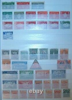 Grande collection de timbres de Hongrie, de Bolivie, de Norvège et du Nicaragua dans un livre de stock de 1000 exemplaires