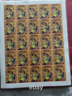 Grande collection de timbres vintage de Walt Disney dans un album de 35 feuilles complètes de 875 timbres