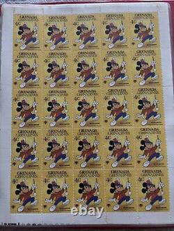 Grande collection de timbres vintage de Walt Disney dans un album de 35 feuilles complètes de 875 timbres