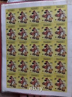 Grande collection de timbres vintage de Walt Disney dans un album de 35 feuilles complètes de 875 timbres