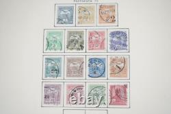 HONGRIE 1870-1940 COLLECTION DE PLUS DE 550 TIMBRES NEUFS ET USAGÉS DANS UN ALBUM CARDINAL